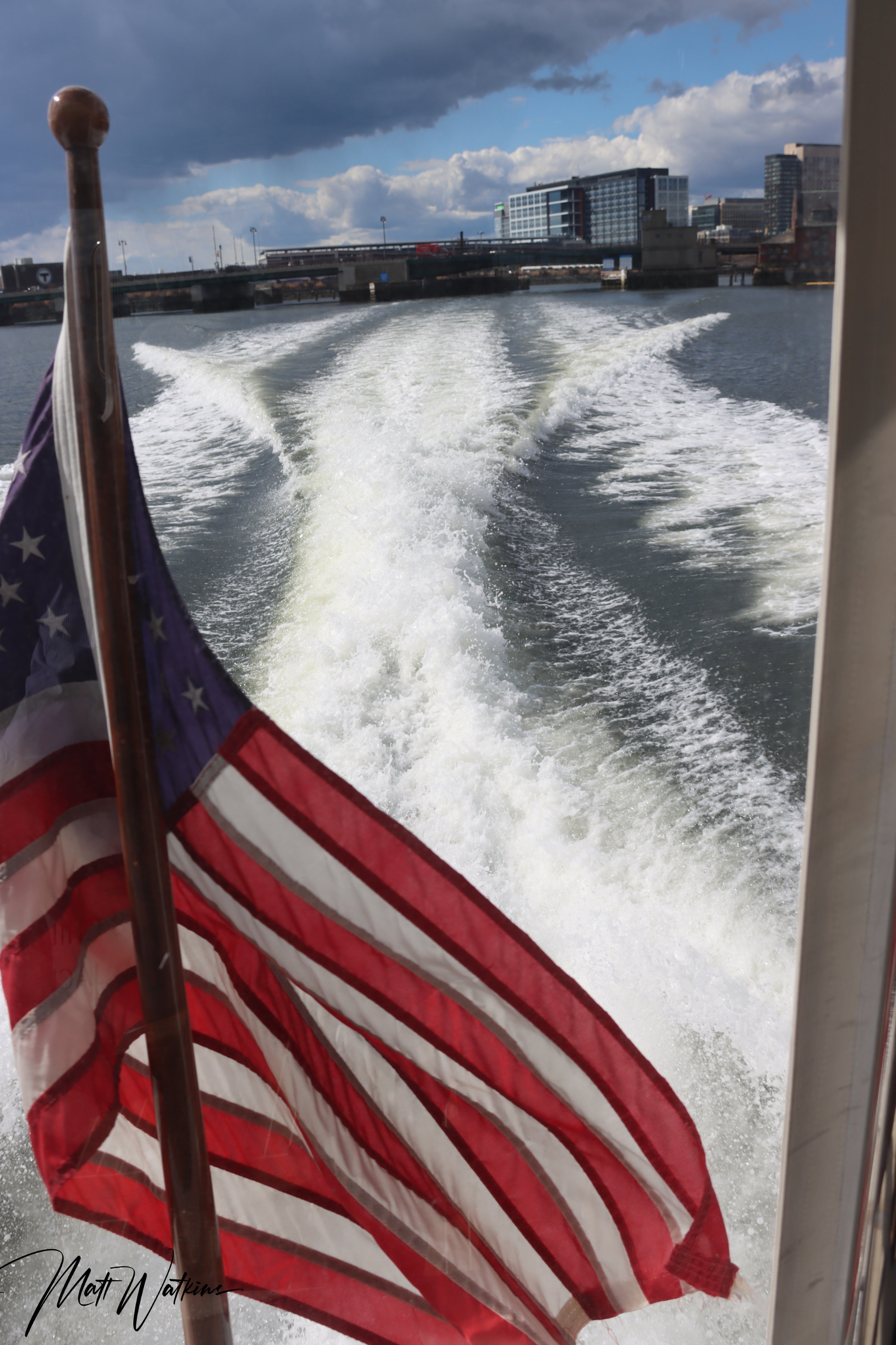 Boston harbor with American Flag